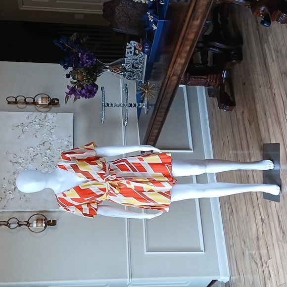 Forever 21 Pants - New Vibrant Orange and Yellow Patterned Wrap Mini Rorper. Size L